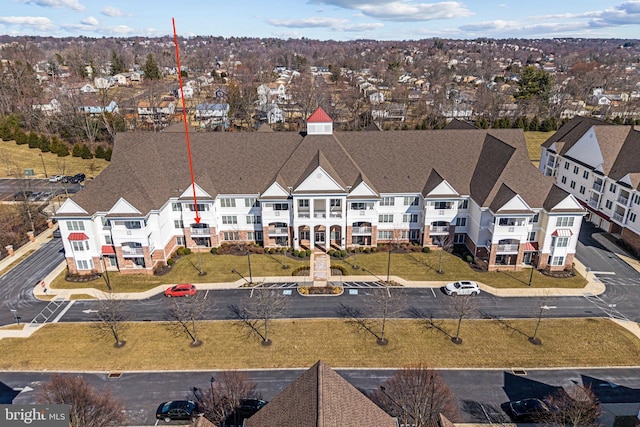 drone / aerial view with a residential view