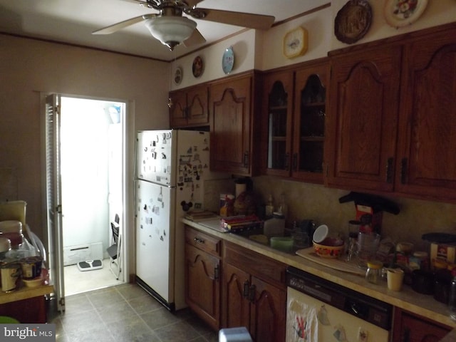 kitchen with light countertops, a ceiling fan, a baseboard heating unit, glass insert cabinets, and white appliances