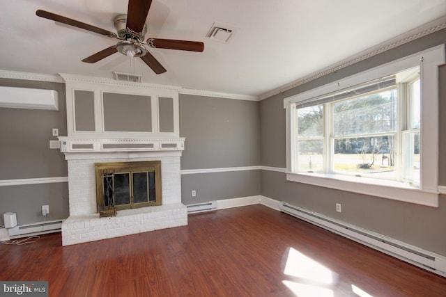 unfurnished living room with dark wood-style floors, visible vents, a baseboard heating unit, and an AC wall unit