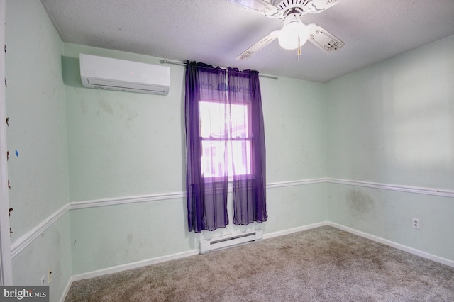 spare room featuring a textured ceiling, a wall unit AC, a baseboard heating unit, carpet floors, and baseboards