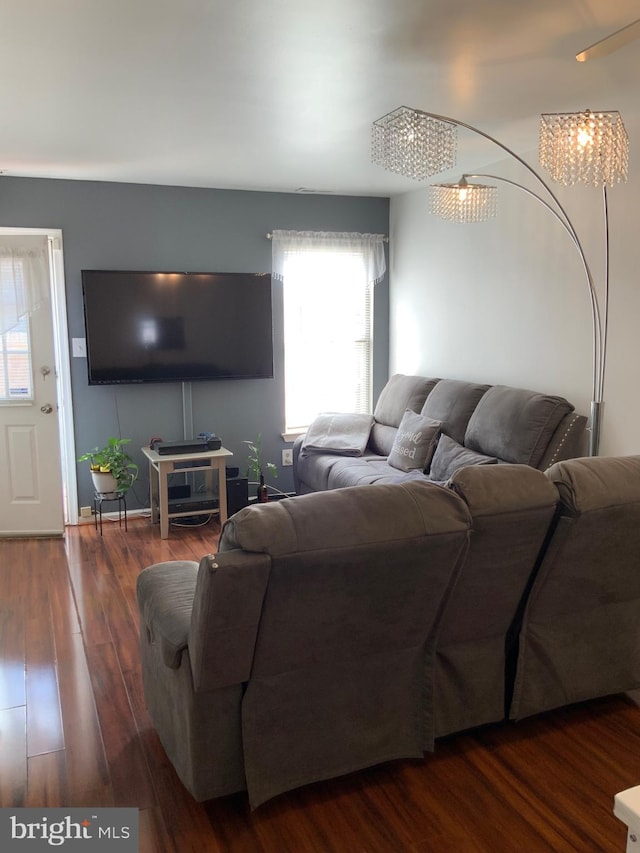 living room with wood finished floors