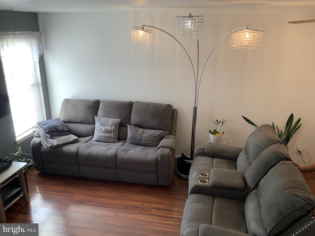 living area with wood finished floors and a wealth of natural light