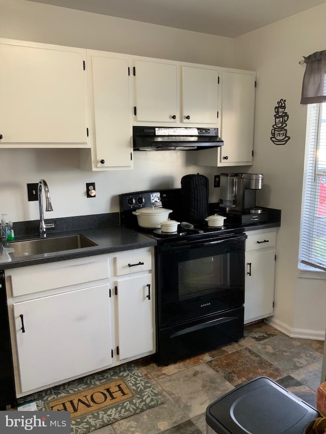 kitchen with dark countertops, black range with electric stovetop, under cabinet range hood, white cabinets, and a sink