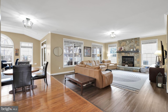 13110 Ogles Hope Dr, Bowie, MD 20720 - living room with ornamental molding, plenty of natural light, a fireplace, and wood finished floors