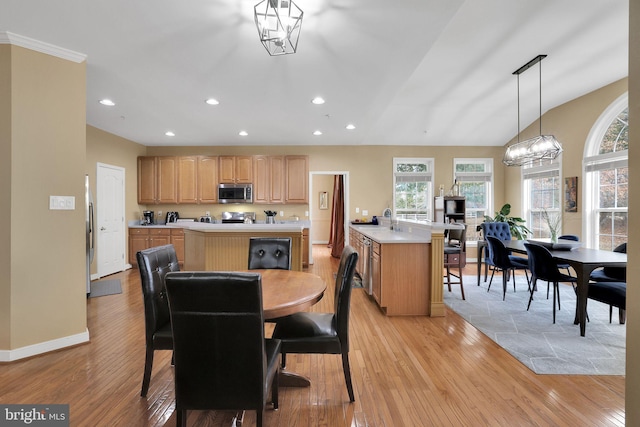 13110 Ogles Hope Dr, Bowie, MD 20720 - dining room featuring baseboards, vaulted ceiling, recessed lighting, and light wood-style floors