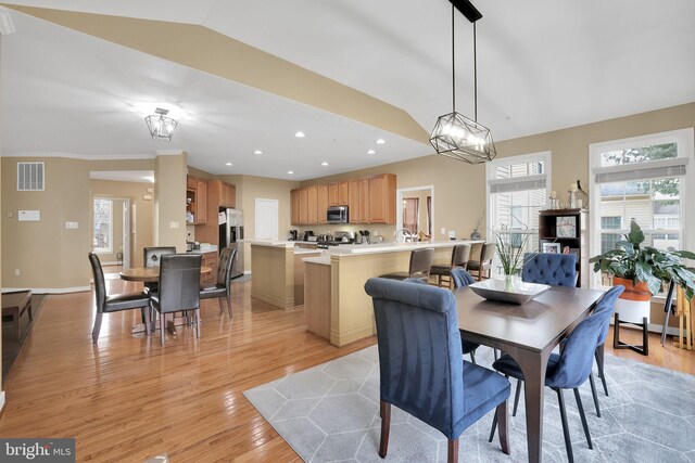 13110 Ogles Hope Dr, Bowie, MD 20720 - dining room with recessed lighting, visible vents, baseboards, vaulted ceiling, and light wood-style floors
