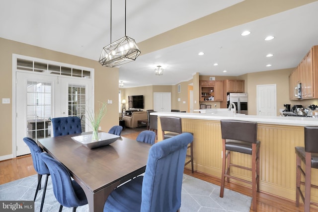 13110 Ogles Hope Dr, Bowie, MD 20720 - dining room featuring a chandelier, recessed lighting, french doors, and light wood finished floors