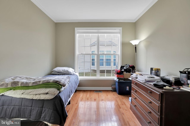 13110 Ogles Hope Dr, Bowie, MD 20720 - bedroom featuring ornamental molding, visible vents, light wood-style flooring, and baseboards