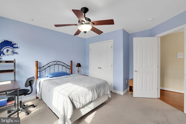 13110 Ogles Hope Dr, Bowie, MD 20720 - bedroom with ceiling fan, baseboards, a closet, and light colored carpet