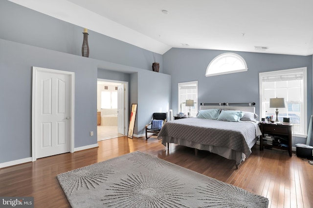 13110 Ogles Hope Dr, Bowie, MD 20720 - bedroom with baseboards, visible vents, vaulted ceiling, and wood finished floors