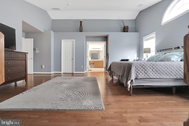 13110 Ogles Hope Dr, Bowie, MD 20720 - bedroom featuring high vaulted ceiling, wood finished floors, visible vents, and baseboards