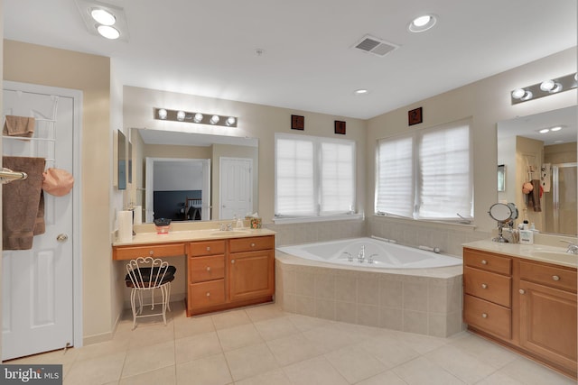 13110 Ogles Hope Dr, Bowie, MD 20720 - bathroom with a bath, a sink, visible vents, and tile patterned floors