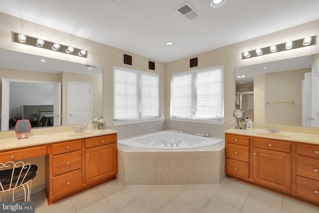 13110 Ogles Hope Dr, Bowie, MD 20720 - bathroom featuring a bath, tile patterned flooring, visible vents, and a sink