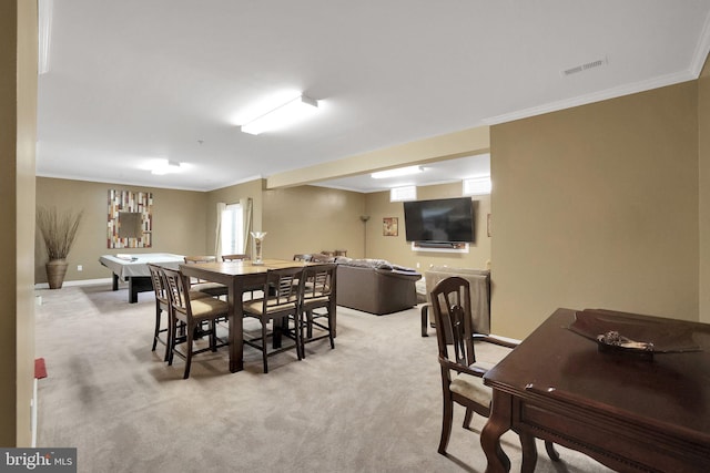 13110 Ogles Hope Dr, Bowie, MD 20720 - dining area featuring light carpet, baseboards, visible vents, and ornamental molding