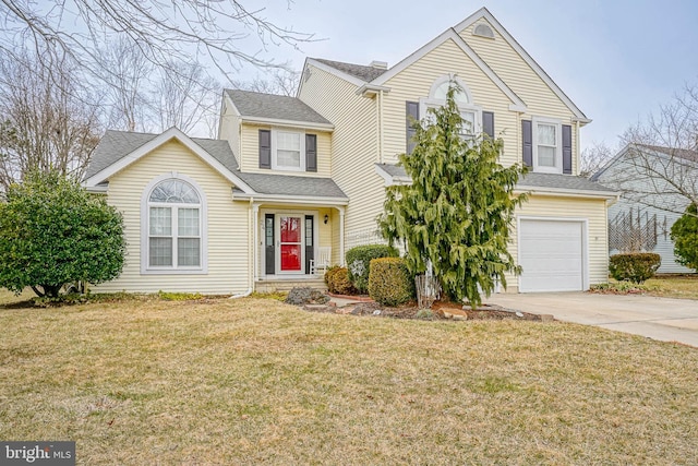 traditional home featuring a garage, a front yard, driveway, and a shingled roof