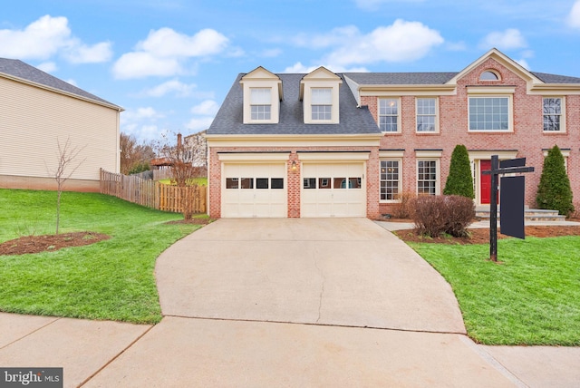 view of front of property featuring brick siding, a shingled roof, concrete driveway, fence, and a front yard