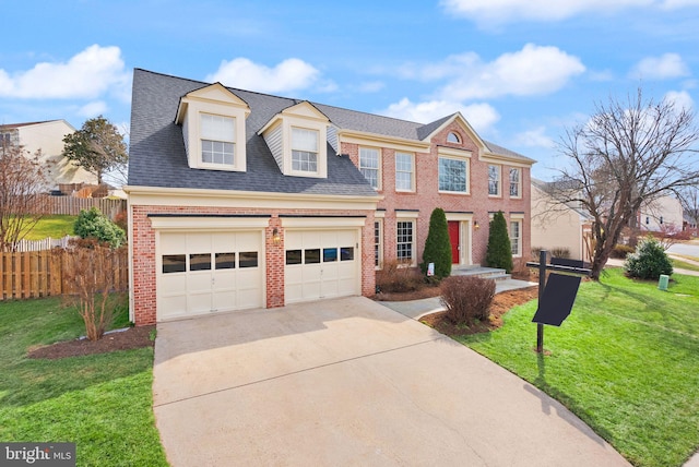 view of front of home featuring brick siding, an attached garage, fence, driveway, and a front lawn