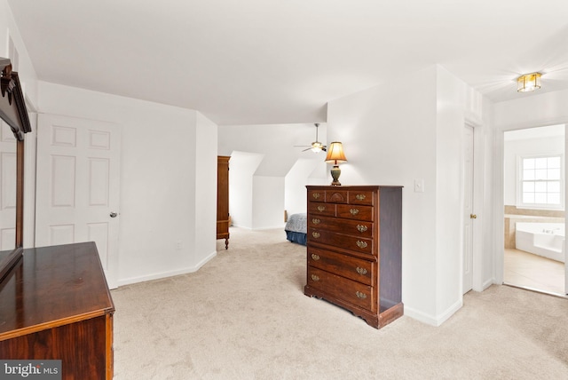 bonus room with carpet flooring, ceiling fan, and baseboards