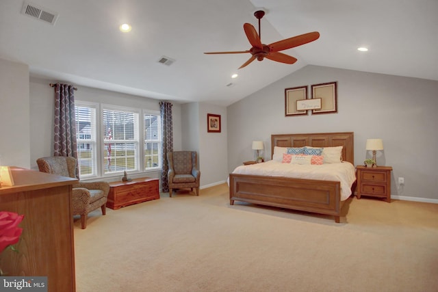 bedroom with light colored carpet, lofted ceiling, visible vents, and recessed lighting