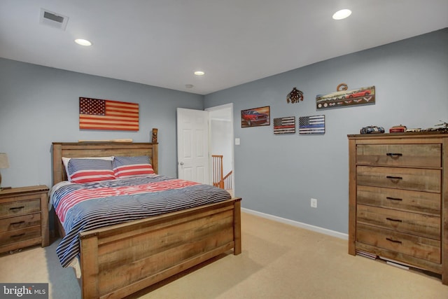 bedroom featuring light carpet, baseboards, visible vents, and recessed lighting