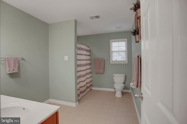 full bathroom with baseboards, visible vents, toilet, tile patterned floors, and vanity