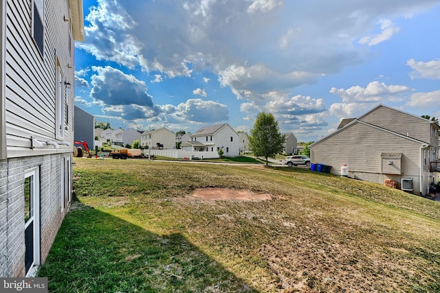 view of yard featuring a residential view