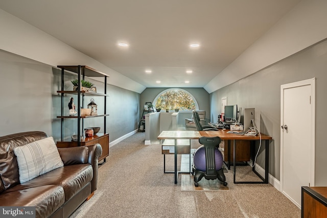 carpeted office space featuring recessed lighting, baseboards, and lofted ceiling