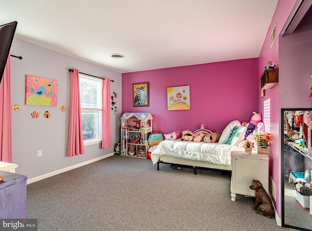 bedroom featuring visible vents, baseboards, and carpet floors