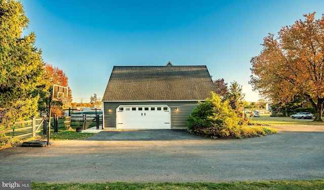 garage featuring fence