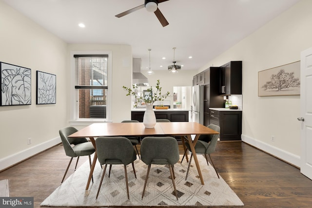 dining area with dark wood-type flooring, recessed lighting, ceiling fan, and baseboards