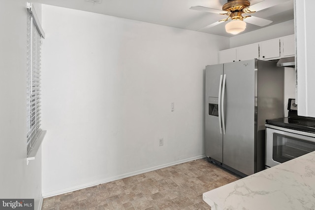 kitchen with ceiling fan, baseboards, under cabinet range hood, stainless steel appliances, and white cabinetry