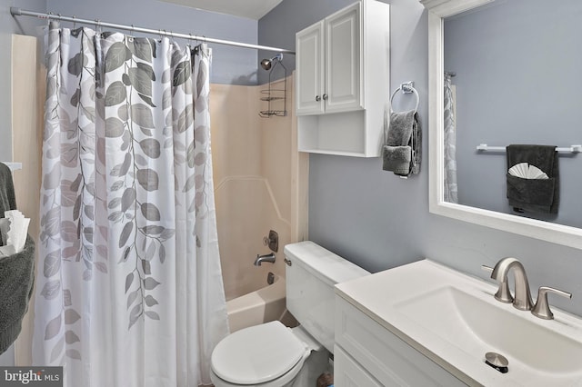 bathroom with toilet, vanity, and shower / bath combination with curtain