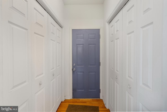 doorway with light wood-style floors