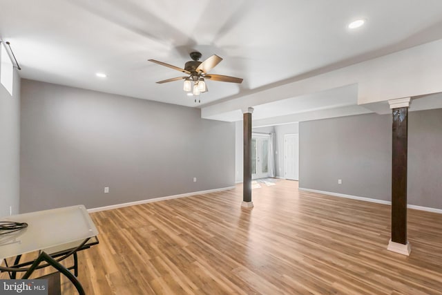 finished basement with recessed lighting, baseboards, ceiling fan, and light wood finished floors