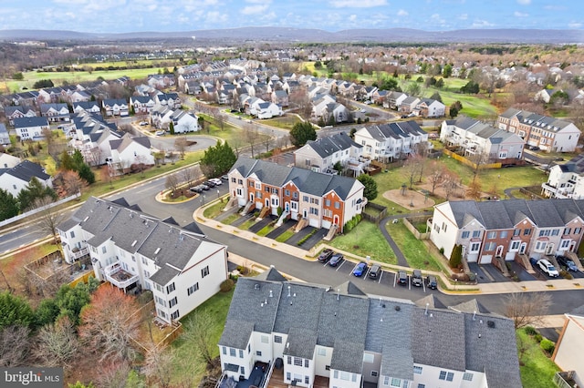 birds eye view of property with a residential view