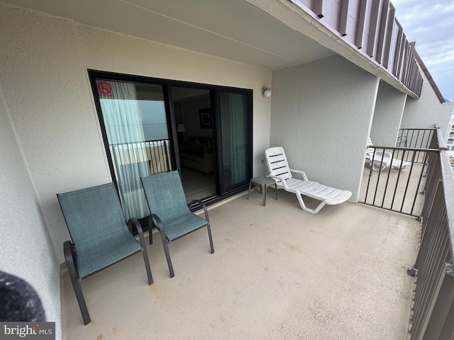 view of patio / terrace with a balcony