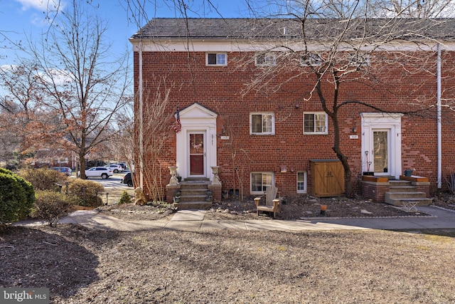 view of front of property featuring brick siding