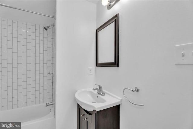 full bathroom with washtub / shower combination and vanity