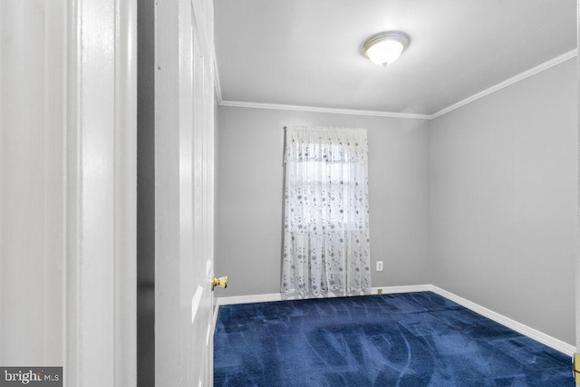 unfurnished room featuring carpet floors, crown molding, and baseboards