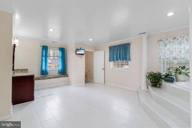 interior space with recessed lighting and baseboards