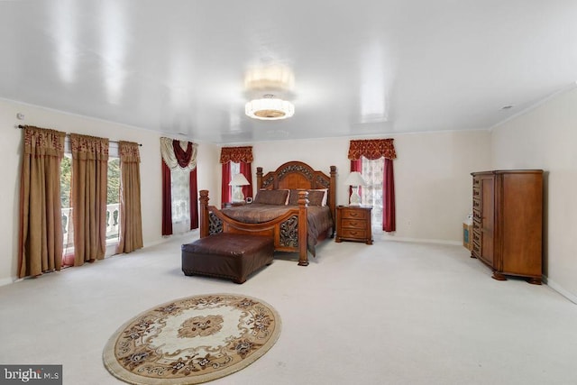 carpeted bedroom with baseboards