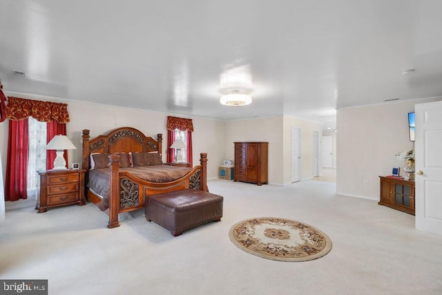 bedroom featuring carpet floors and visible vents