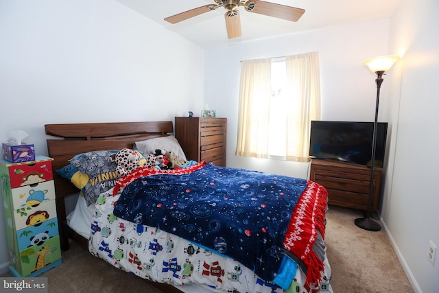 bedroom with carpet floors, a ceiling fan, and baseboards