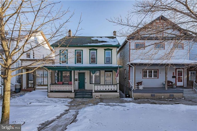 view of front of home featuring covered porch