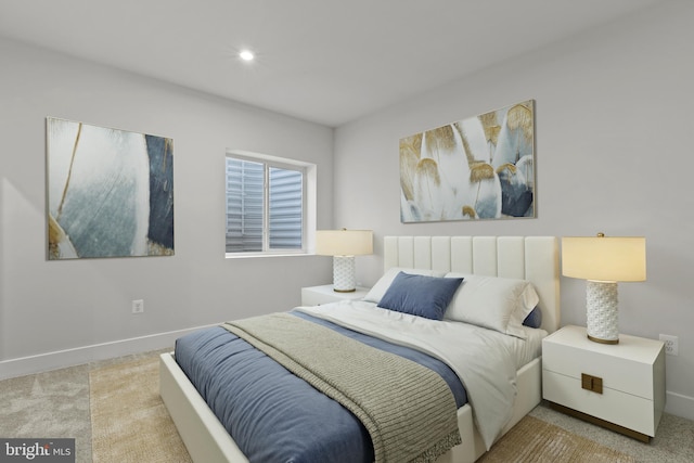 bedroom with light carpet, baseboards, and recessed lighting