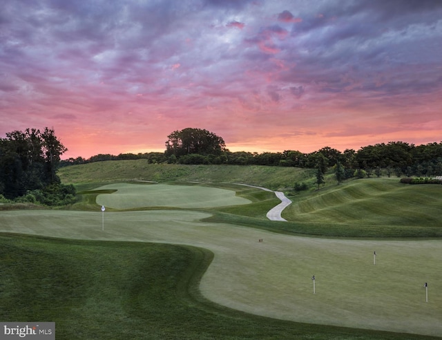 view of property's community featuring view of golf course