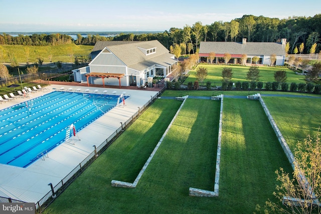 community pool featuring a patio, fence, and a pergola