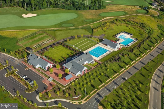 birds eye view of property featuring view of golf course