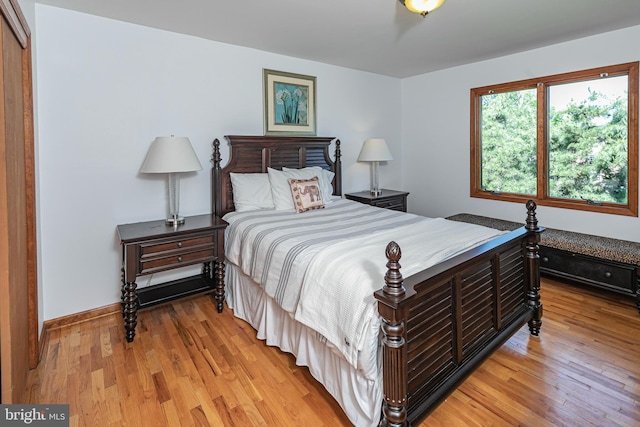 bedroom with light wood-style floors