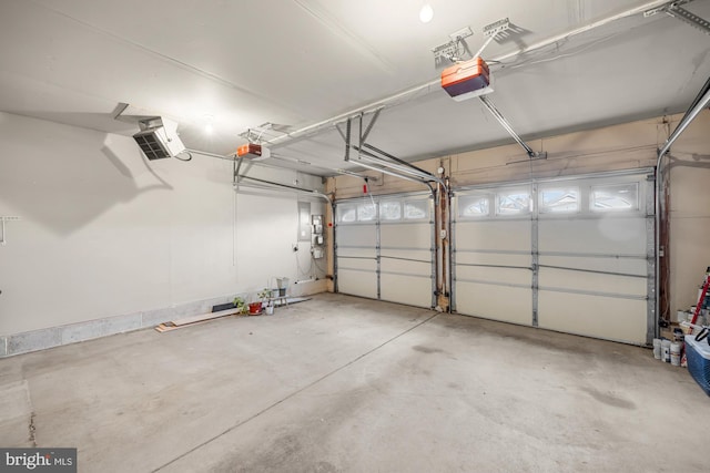 garage featuring a garage door opener